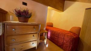 Postel nebo postele na pokoji v ubytování Sarochin Appartamenti