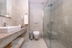 Koupelna v ubytování Lims Bona Dea Beach Hotel