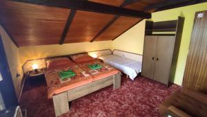Postel nebo postele na pokoji v ubytování Apartmán Vika