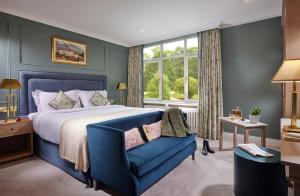 A bed or beds in a room at Great Southern Killarney