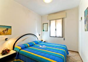 A bed or beds in a room at Glicini
