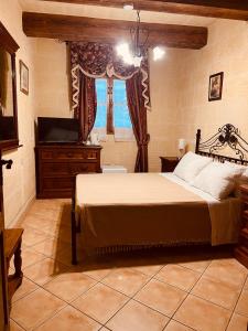 Narcisa Farmhouse B&B客房内的一张或多张床位
