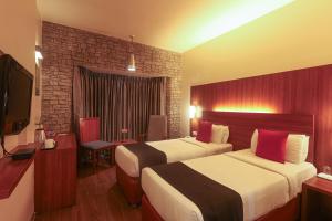 TV a/nebo společenská místnost v ubytování Orbett Hotel