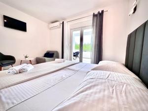 Postel nebo postele na pokoji v ubytování Villa Duce in Omis, private pool