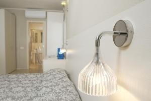Postel nebo postele na pokoji v ubytování Domu Noa Hotel