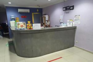 a counter in a grocery store with a counter at Dongfang Motel in Kuala Lumpur