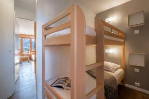 Postel nebo postele na pokoji v ubytování Résidence Pierre & Vacances Saskia Falaise