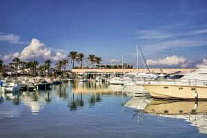 a bunch of boats are docked in a marina at Villa Mirante - Maruggio in Maruggio