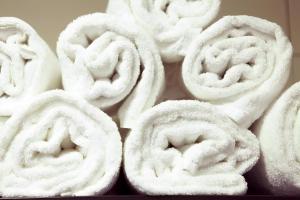 a pile of white rolls on a table at Sleephotels in Hamburg