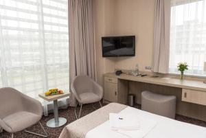 TV a/nebo společenská místnost v ubytování Košice Hotel