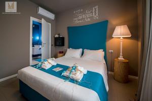 Postel nebo postele na pokoji v ubytování Art B&B Design + 37 fotografií