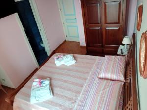 Voodi või voodid majutusasutuse B&B A TAVERNA toas