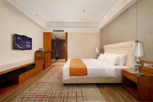 Letto o letti in una camera di Zhongshan Phoenix By Funyard
