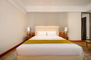 Letto o letti in una camera di Zhongshan Phoenix By Funyard