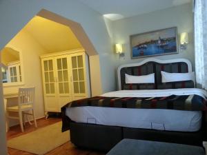 Postel nebo postele na pokoji v ubytování Hotel Taksim Home