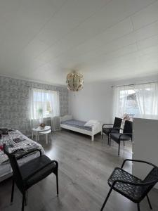 Postel nebo postele na pokoji v ubytování Ödeshög Modernt och stilfullt B&B + 17 fotografií
