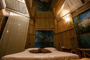 A bed or beds in a room at Hotel Carosello