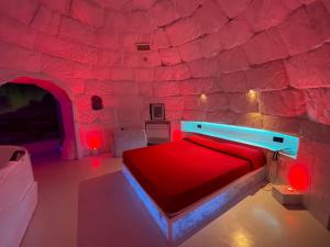 A television and/or entertainment centre at Hotel Carosello