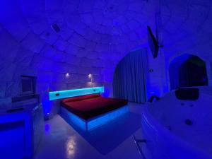 A bed or beds in a room at Hotel Carosello