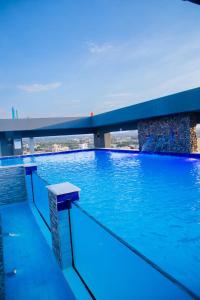 a swimming pool on top of a building at Best Western Dodoma City Hotel in Dodoma
