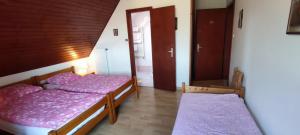 Postel nebo postele na pokoji v ubytování Chambre d'hôtes de la tulipe