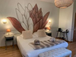 Postel nebo postele na pokoji v ubytování Hôtel Vintage