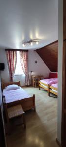 Postel nebo postele na pokoji v ubytování Chambre d'hôtes de la tulipe