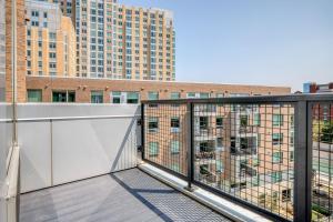 a balcony with a view of a building at East Cambridge 2br w gym wd nr green line BOS-876 in Boston