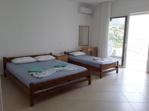 Postel nebo postele na pokoji v ubytování Spiro Guest House