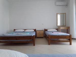 Postel nebo postele na pokoji v ubytování Spiro Guest House