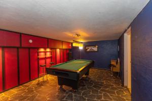 a billiard room with a pool table in it at Sirdalsvatnet Hotel in Tonstad