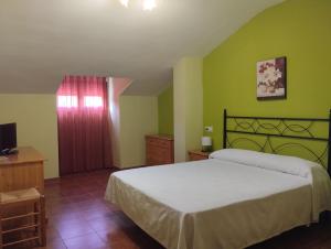 Postel nebo postele na pokoji v ubytování Hotel Condado de Miranda