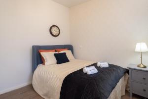 Letto o letti in una camera di Host Wise - Impressive Restful Houses