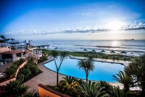 a view of the ocean from a resort with a swimming pool at Beverly Hills in Durban