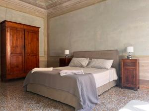Ένα ή περισσότερα κρεβάτια σε δωμάτιο στο Bianca e Nina Charming House