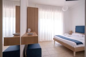 Voodi või voodid majutusasutuse Nautika Suites toas