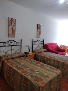 Postel nebo postele na pokoji v ubytování Hotel Condado de Miranda