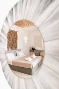 Ein Bett oder Betten in einem Zimmer der Unterkunft Super Paradise Hotel