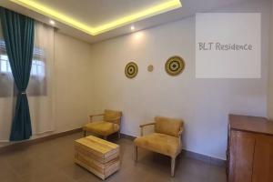BLT Residence - Kasese A serene and tranquil home的休息区
