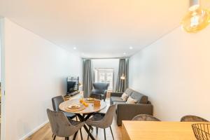 Posezení v ubytování Dom Miguel Apartment By Sé Apartamentos