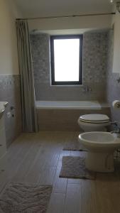 Ванна кімната в Camperlingo