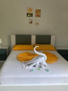 Llit o llits en una habitació de Hotel Potami Beach - Mondi Goro