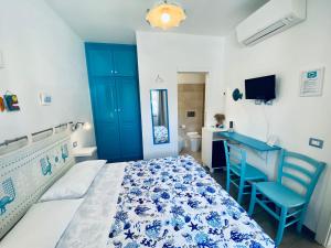 Postel nebo postele na pokoji v ubytování Casetta al mare