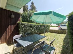 Ein Garten an der Unterkunft L'échappée étoilée - Métabief