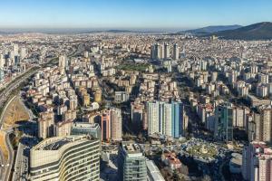 an aerial view of a city with tall buildings at Studio Flat with Panoramic City View in Atasehir in Istanbul