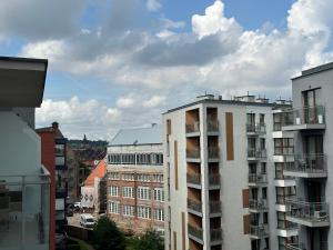 a view of a city with tall buildings at Maya's Flats & Resorts 34 - Chmielna 73 in Gdańsk