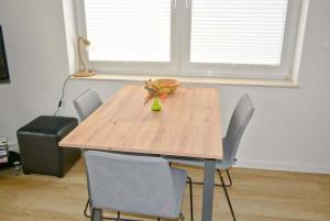 Φωτογραφία από το άλμπουμ του Haus am Golfplatz Nr 01 Ferienwohnung σε Süderhöft