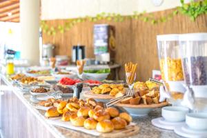 a buffet with many plates of food on a table at Bahar Hotels in Fethiye