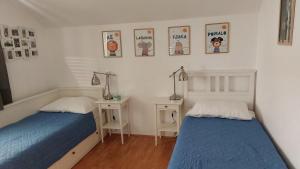 Postel nebo postele na pokoji v ubytování Mislav Apartment
