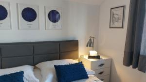 Postel nebo postele na pokoji v ubytování Mislav Apartment